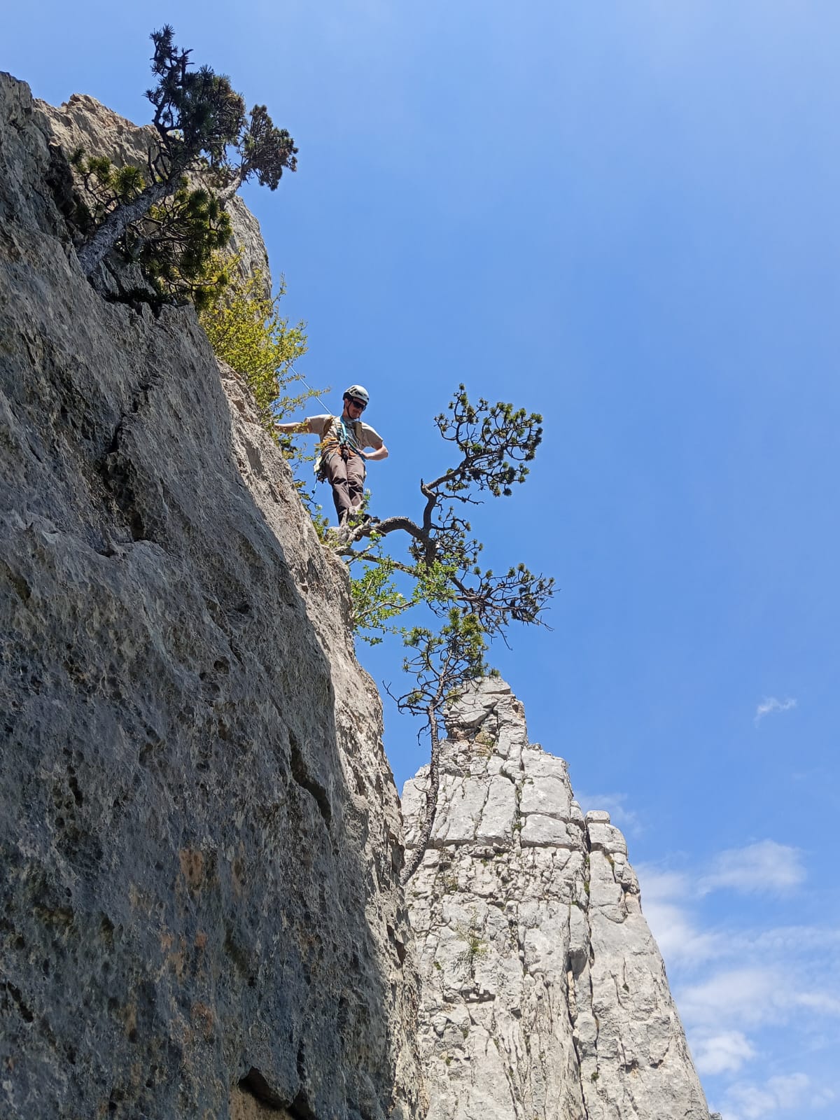Grimpeur en voie traditionnelle aux aiguilles de Bénevise